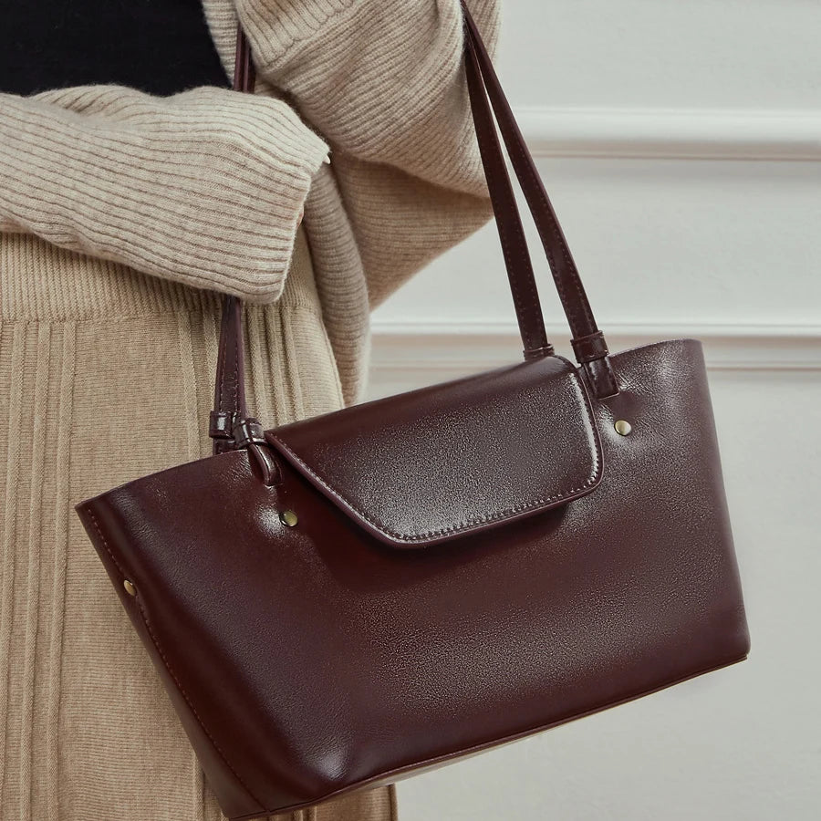 lady carrying the rbj Vegetable Tanned Genuine Leather Handbags.