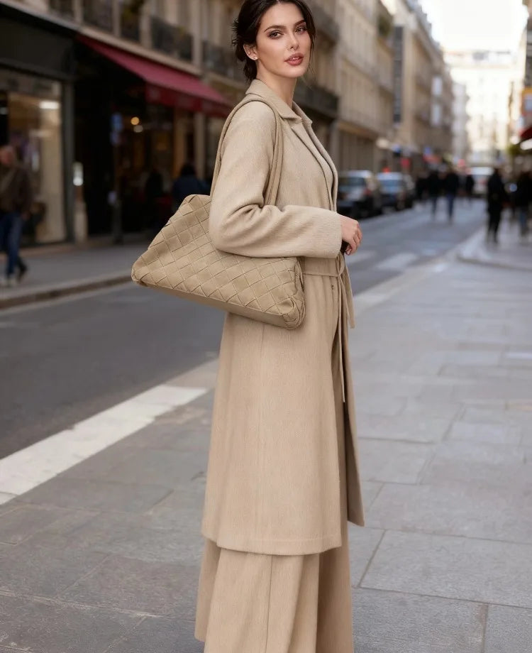 women carrying rbj desinger Woven Tote Bag. Woven Tote Bag.